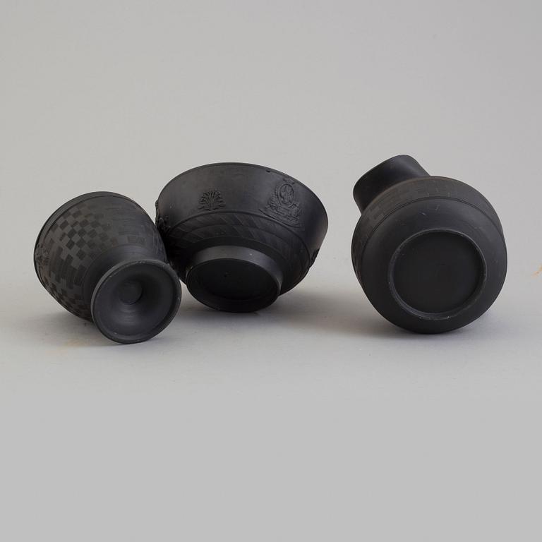 AN ENGLISH BASALT JUG, LIDDED BOWL AND BOWL, first half of the 19th century.