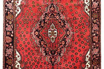 An Azerbaijan carpet, c. 306 x 208 cm.