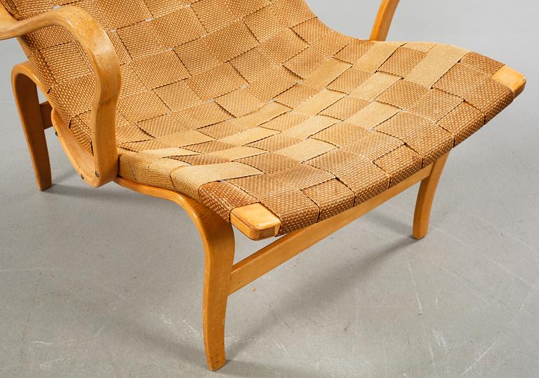 A "Pernilla" easy chair, designed by Bruno Mathsson for Firma Karl Matsson, made 1943.