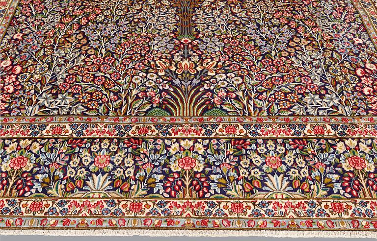 A Kerman Laver carpet, 'Millefleur', approx. 406 x 295 cm.