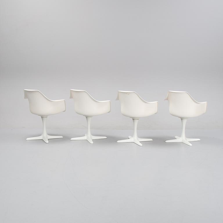 A dining set with a table and four chairs by Maurie Burke for Arkana, second half of the 20th Century.
