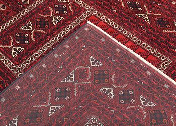 A Afghan carpet, 256 x 168 cm.