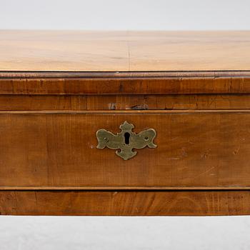 A George II walnut partner's desk, mid 18th century.