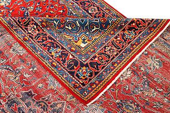 A Hamadan carpet, a. 320 x 220 cm.