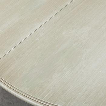A dining table and six chairs, Gustavian style, second half of the 20th century. One leaf included.