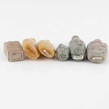 Eight snuff bottles, mottled stone, China, 20th century.