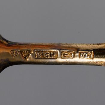 MOCKASKEDAR, 12 st, silver 916 och emalj, Tillander, Helsingfors 1951. Vikt 135 g.