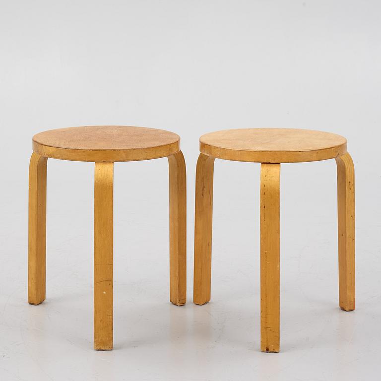 Alvar Aalto, a pair of model 60 stools, Artek, mid 20cth century.