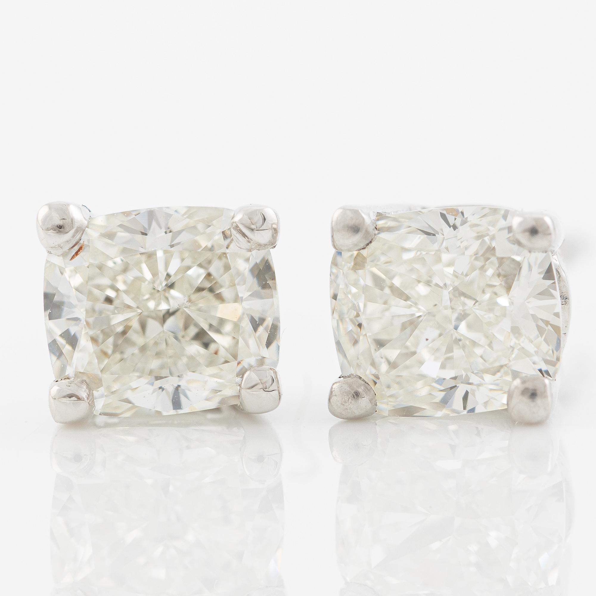 Earrings, a pair, 18K white gold with cushion-cut diamonds totalling 1.44 ct, accompanied by GIA dossier.