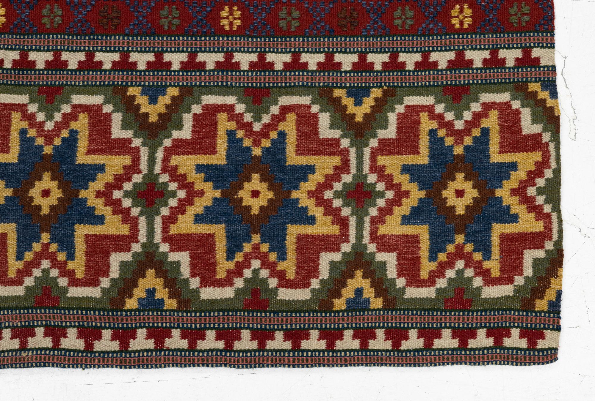 A bench cushion, flat weave, c. 262 x 64 cm, Scania, around the year 1900.