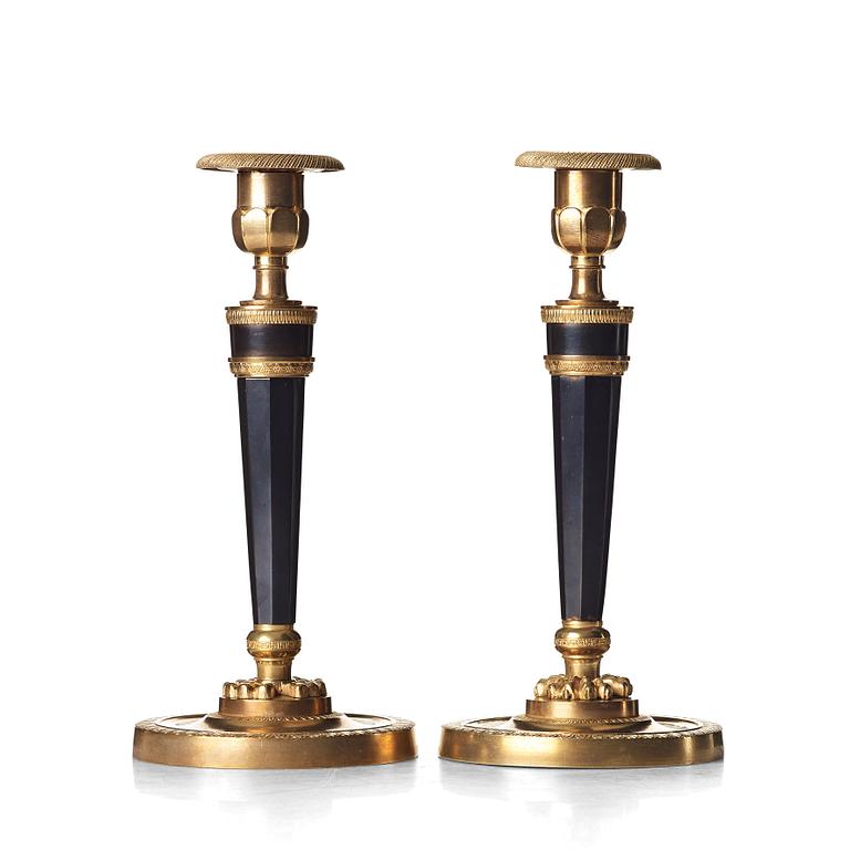 A pair of French Directoire candlesticks, circa 1800.