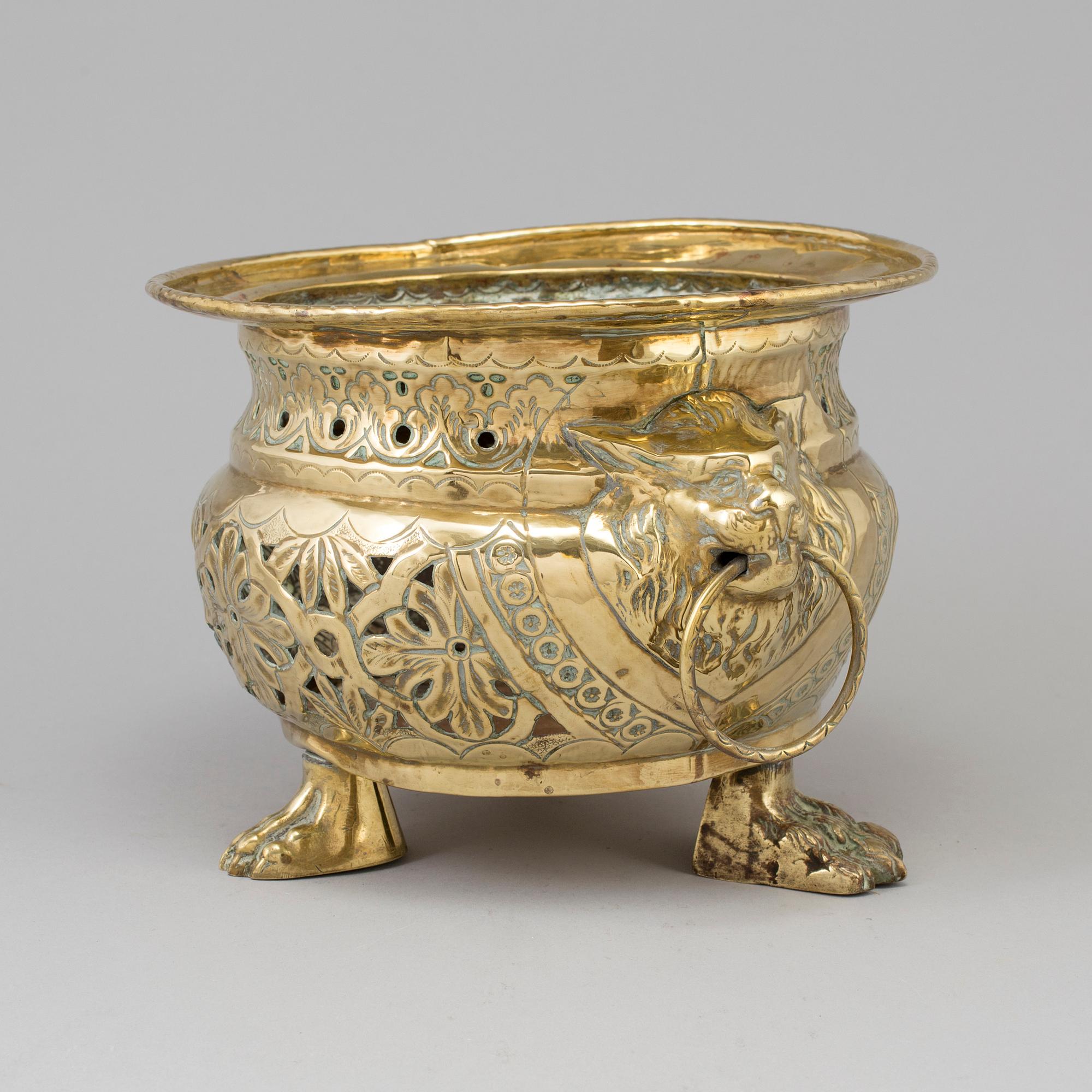 A 18th/19th century brass flower pot.