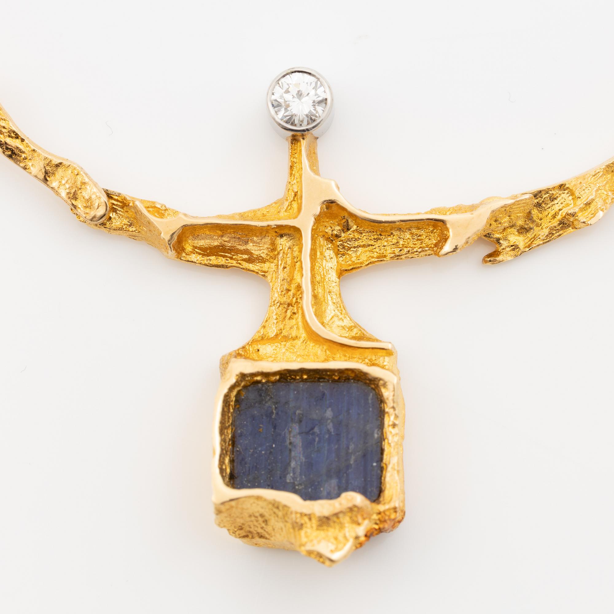 Lapponia necklace 18K gold with spectrolite and brilliant-cut diamond, 1976.