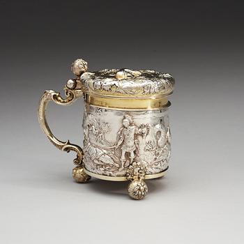 A Swedish 17th century parcel-gilt tankard, makers mark of Nicolaus Breuman, Stockholm (-1666-1676(1677-)).