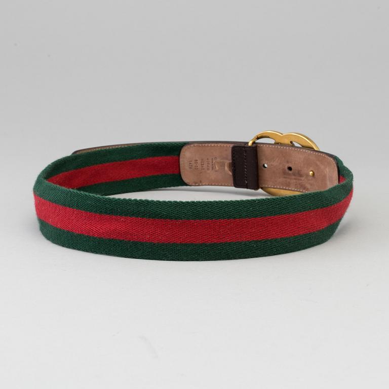 A canvas belt by Gucci.