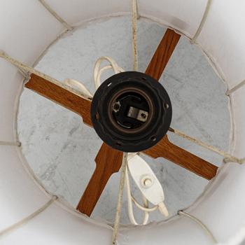 A Swedish teak and oak floor light, 1950's/60's.