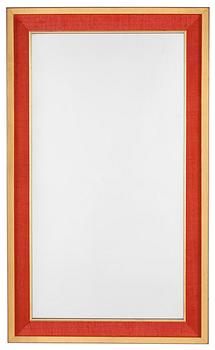 403. A Svenskt Tenn mirror, the frame with red fabric and gilding.