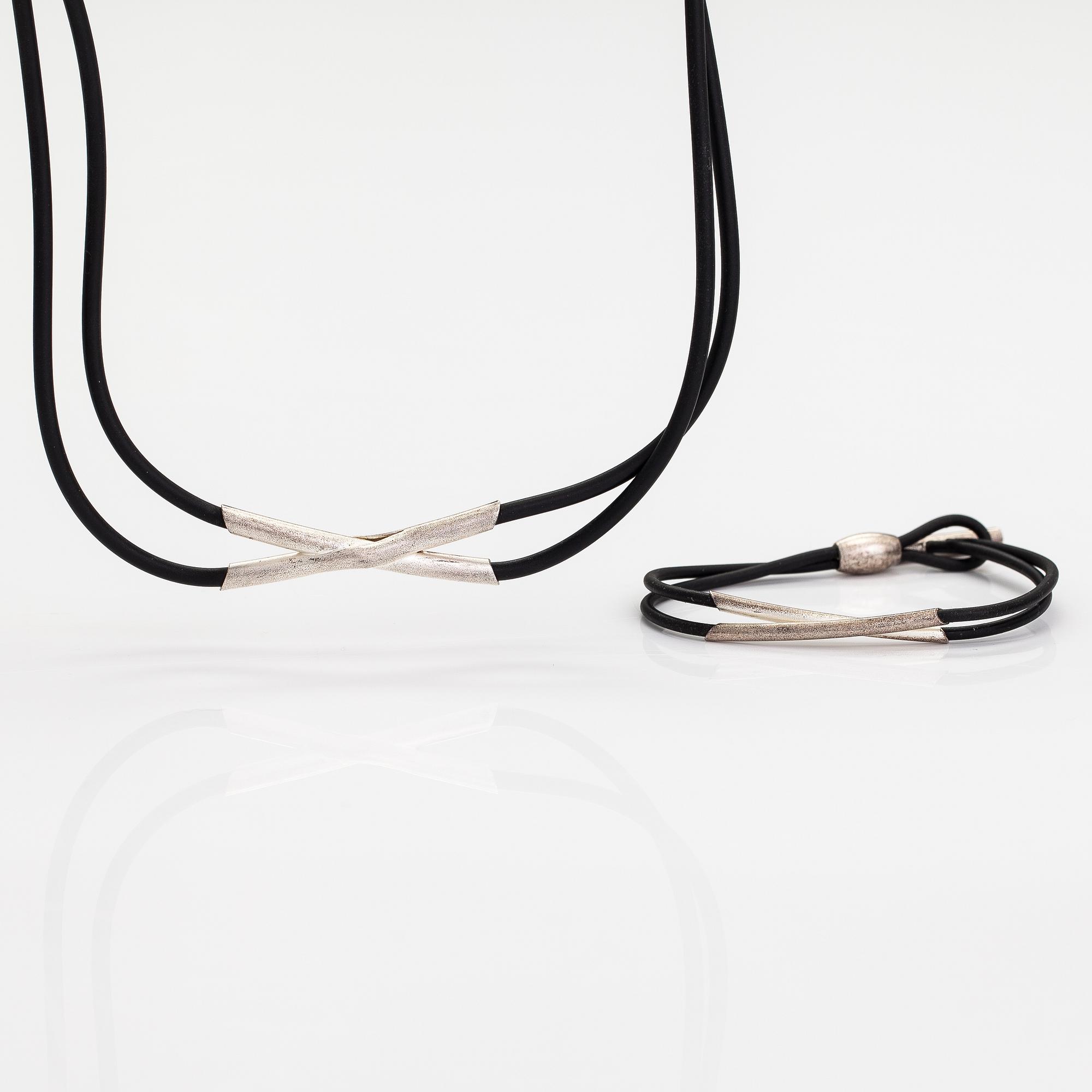 Christoph Burger, A necklace and a bracelet "Edition amour", sterling silver and rubber strap. Lapponia 2003.