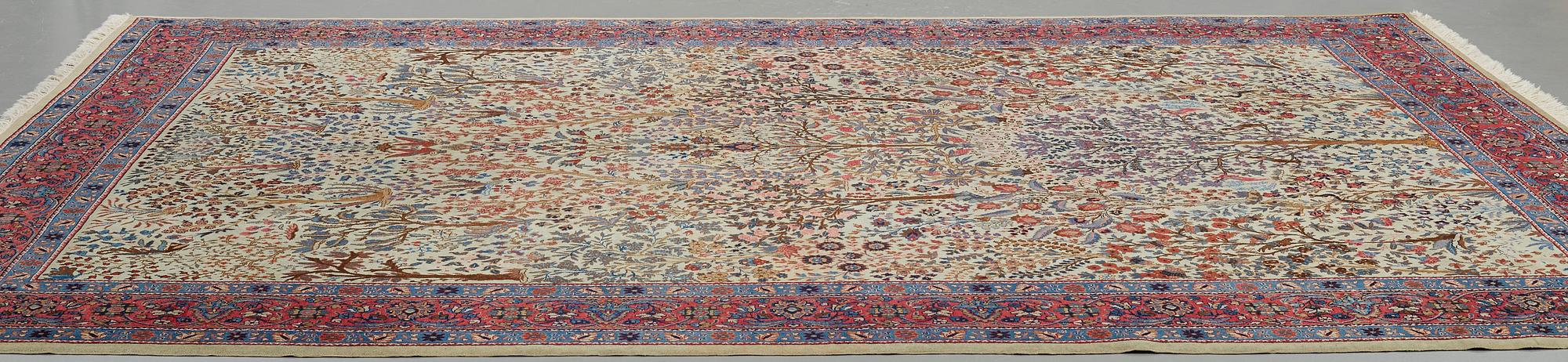 A CARPET, a semi-antique Tabriz probably, ca 393 x 284 cm.