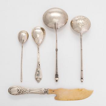 A silver knife by Grachev, and four silver spoons, St. Petersburg, Moscow, and one with Latvian import mark.