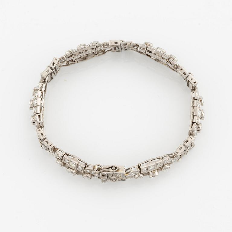 A platinum bracelet with round brilliant-and eight-cut diamonds.