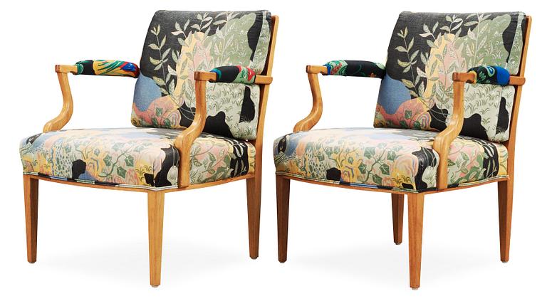 A pair of Josef Frank mahogany and ratten armchairs, Svenskt Tenn, model 969.