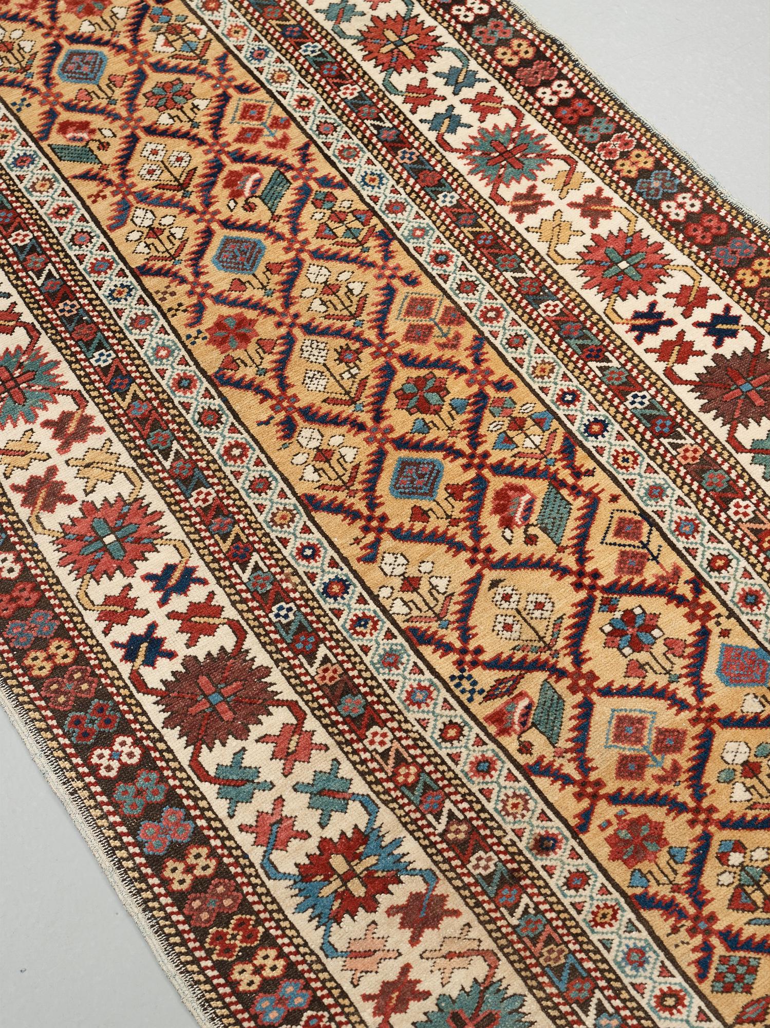 MATTO, an antique Kuba, ca 289,5 x 97 cm (as well as the ends with 1 cm light blue soumak).