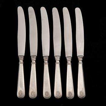 BESTICK, 6+6 "Musslan" silver, Helsingfors 1936-1950. Knivbladen stål. Sammanlagd vikt ca 748 g.