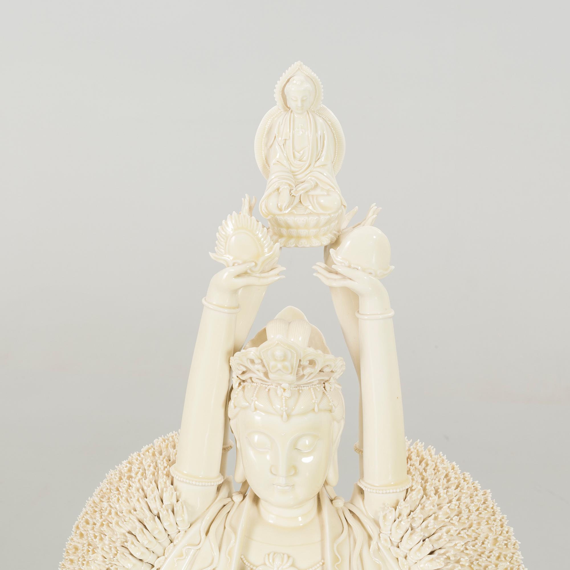 A porcelain figurin, late 20th century,