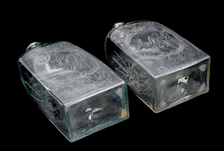 BRÄNNVINSPLUNTOR, 2 st, glas, daterade 1842.