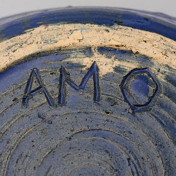 A ceramic bowl signed AMO.
