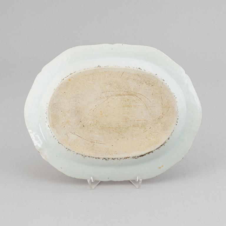 Two famille rose serving dishes and a sauce boat, Qing dynasty, Qianlong (1736-95).