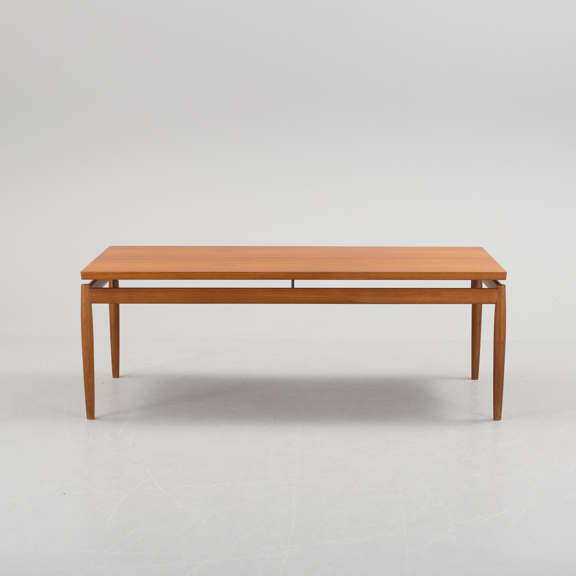 GRETE JALK, a teak coffee table fron France, Denmark, 1963.