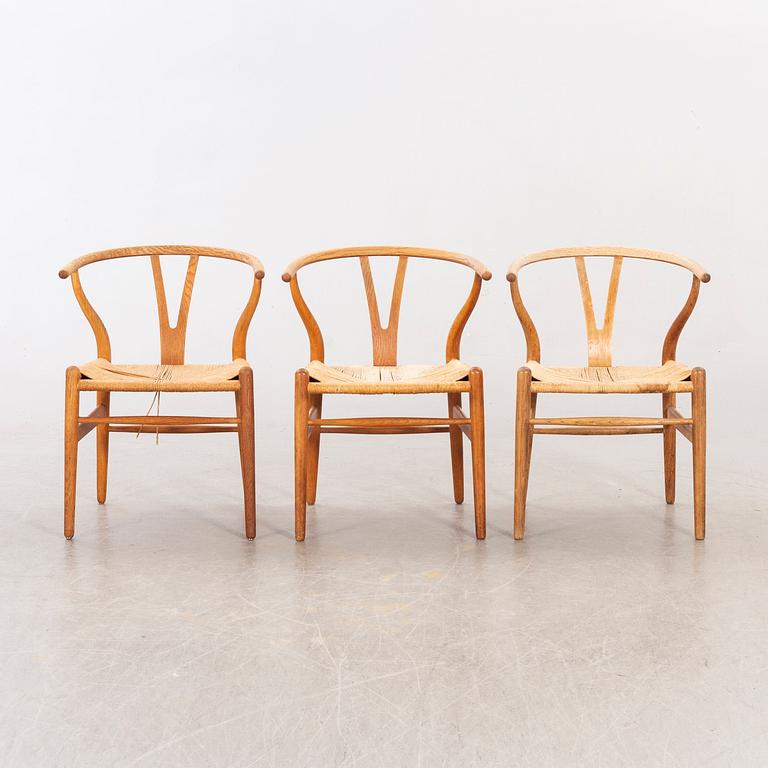 Hans J Wegner, five CH 24 chairs  Carl Hansen & Son, Odense, Denmark.