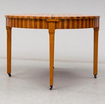 a dining table from the early 20th century.