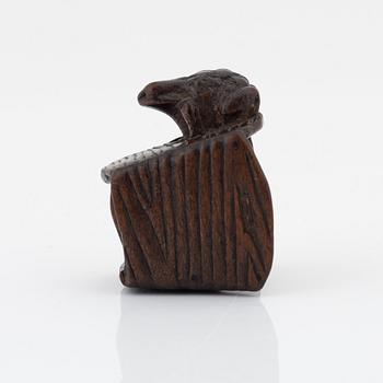 A Japanese wood netsuke of a frog, Masanao Yamada,
Edo period (1615-1868), 19th century.