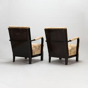 A pair of 1930s 'Panu' armchairs model 234, Asko Finland.