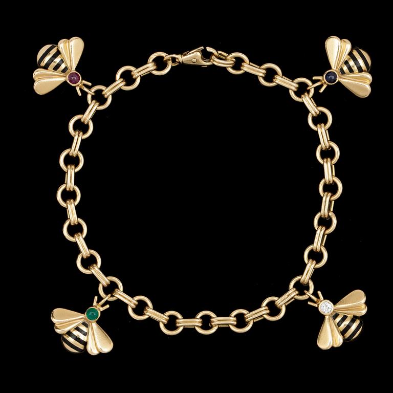 A Cartier gold and black enamel bracelet.