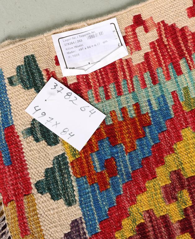 A Kilim runner carpet, c. 497 x 84 cm.