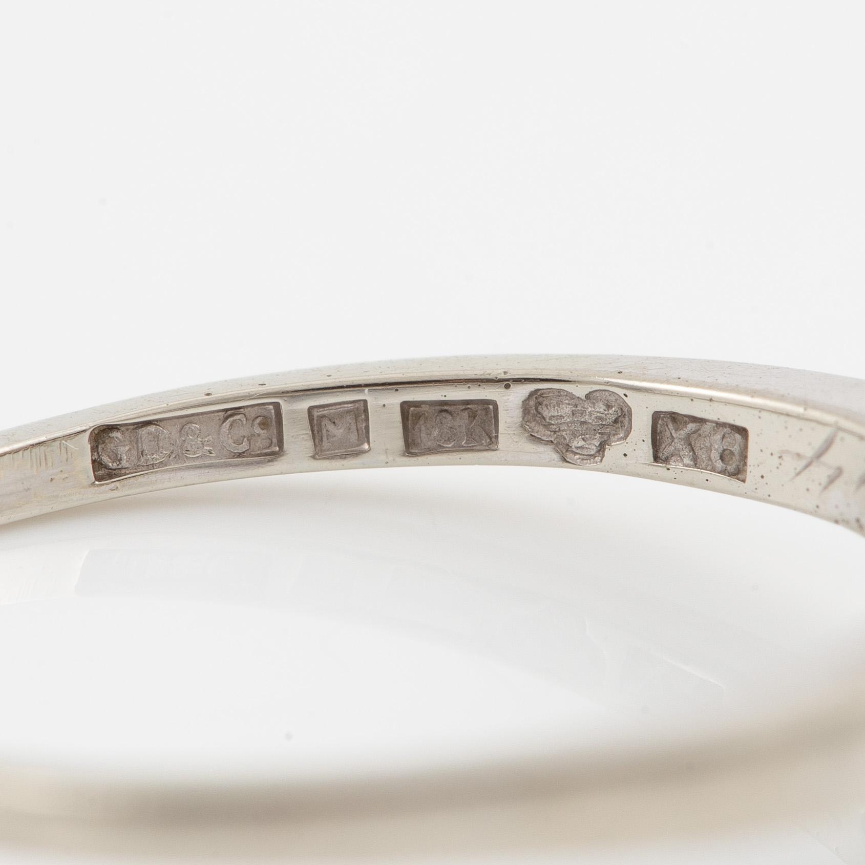 Ring 18K white gold set with round brilliant-cut and eight-cut diamonds.