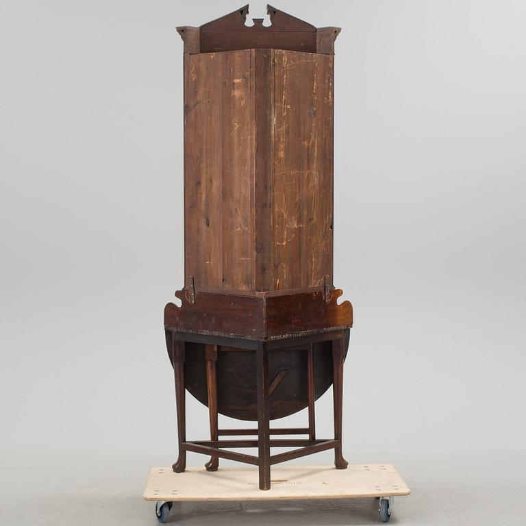 A 19th century table / corner cabinet.