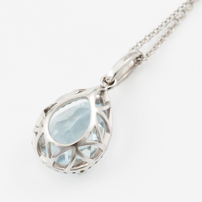 Pendant with chain in 18K white gold set with a faceted aquamarine and round brilliant-cut diamonds.