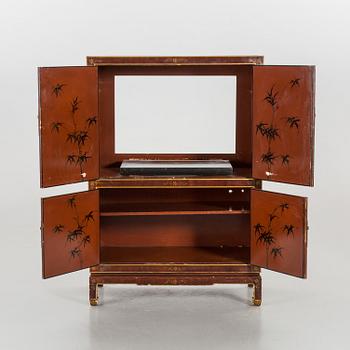 A Chinese style cabinet, later part of the 20th cwentury.