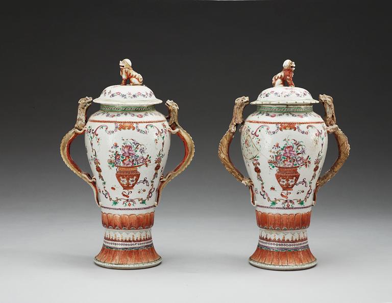 A pair of famille rose vases with covers, Qing dynasty, Qianlong (1736-95).