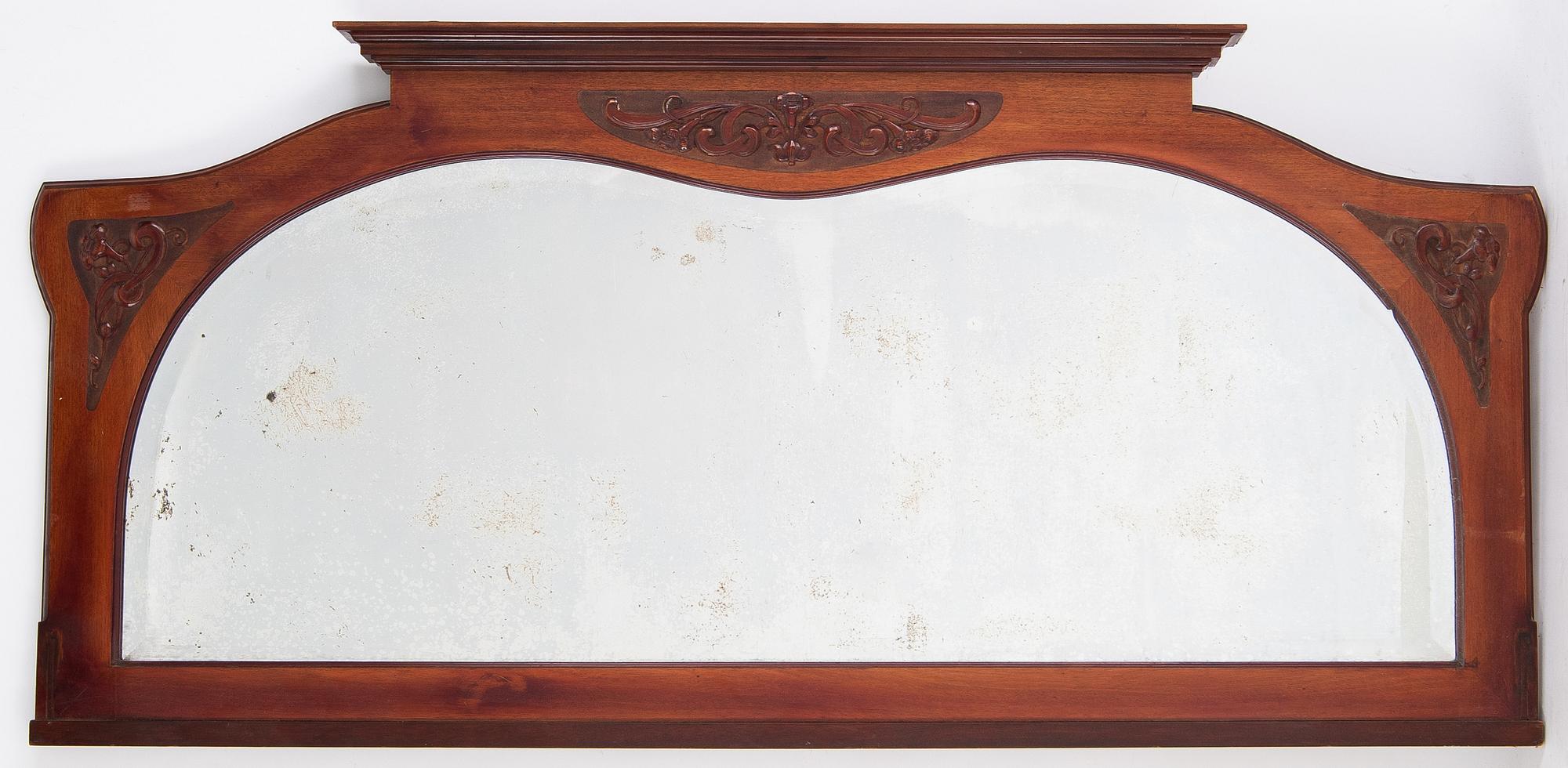 A mahogany Art Nouveau mirror, early 20th century.