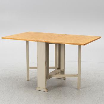 Carl Malmsten, a drop-leaf table, "Vapensmeden", second half of the 20th century.
