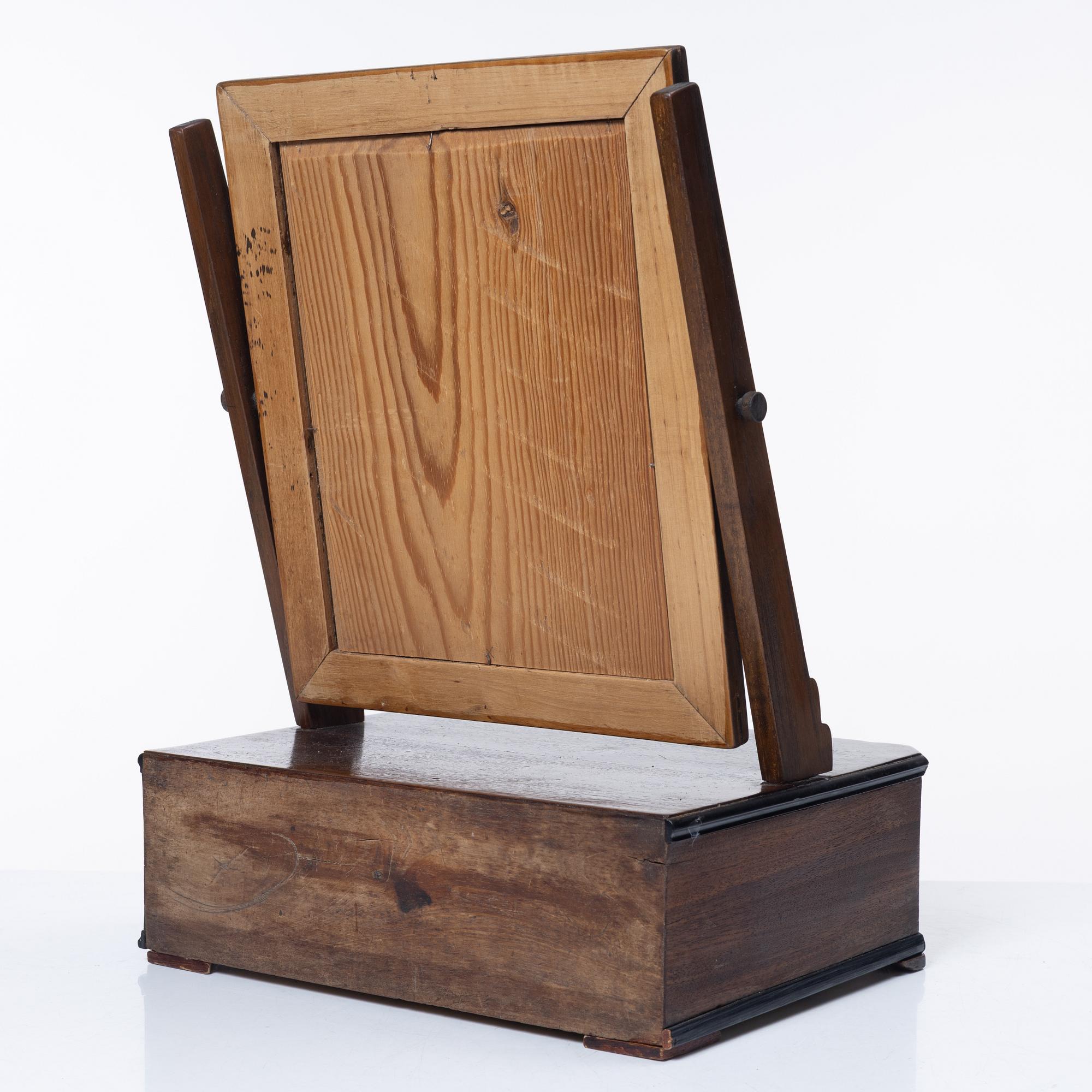 A mahogany table mirror, Sweden, dated 1820.