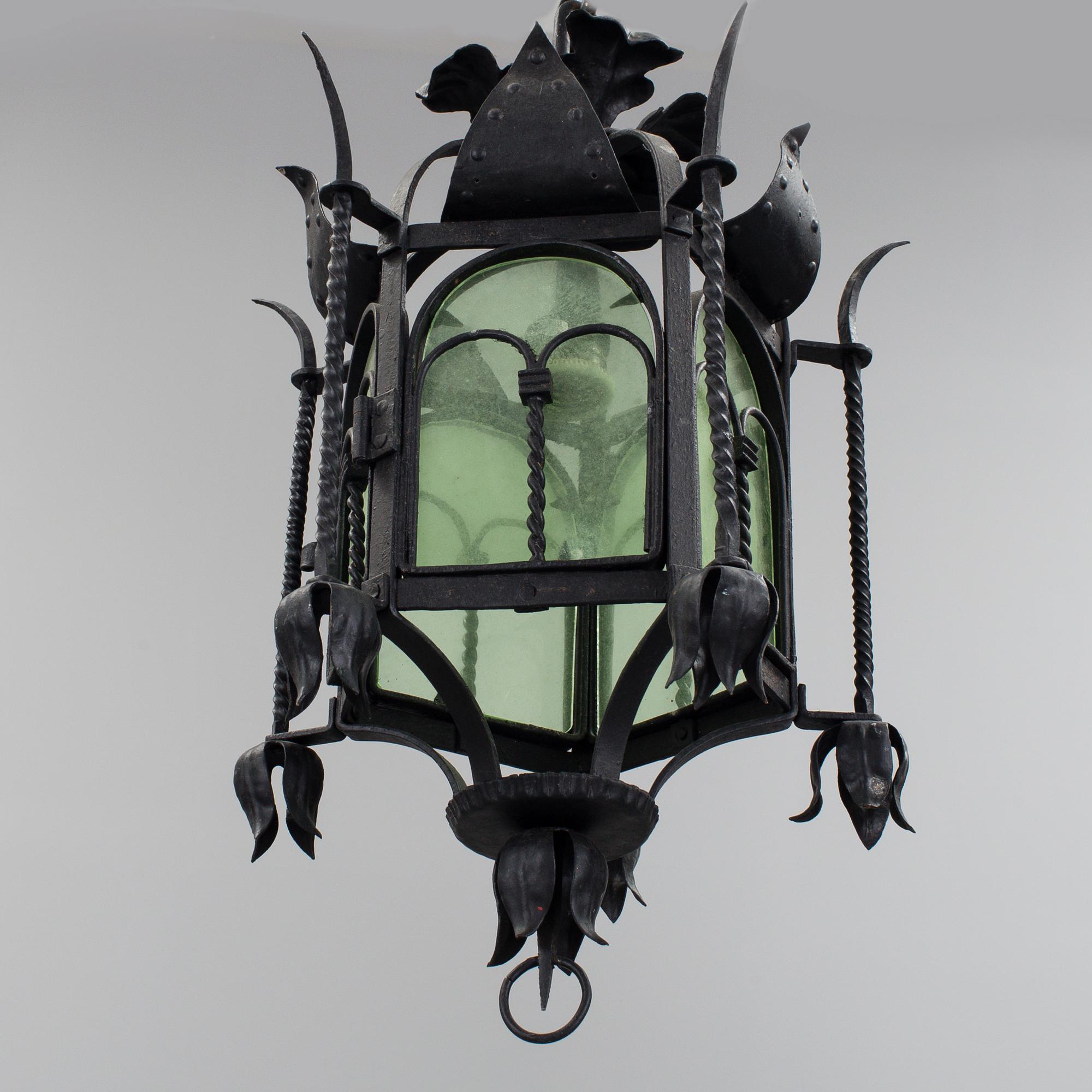 A wrought iron ceiling light first half of the 20th century.