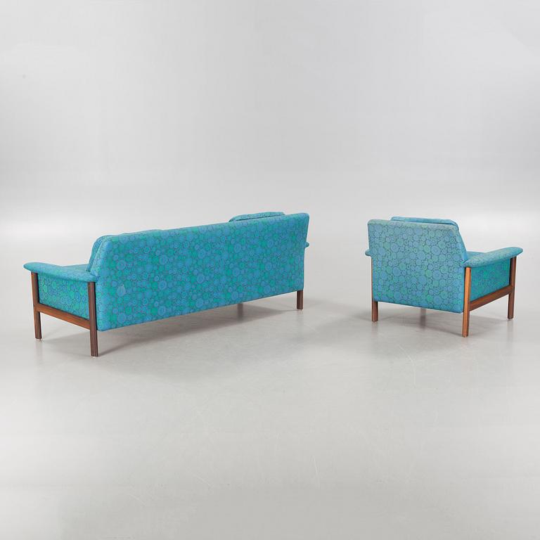 A 1960s "Oklahoma" sofa and armchair by Folke Ohlsson for Dux Möbel AB.