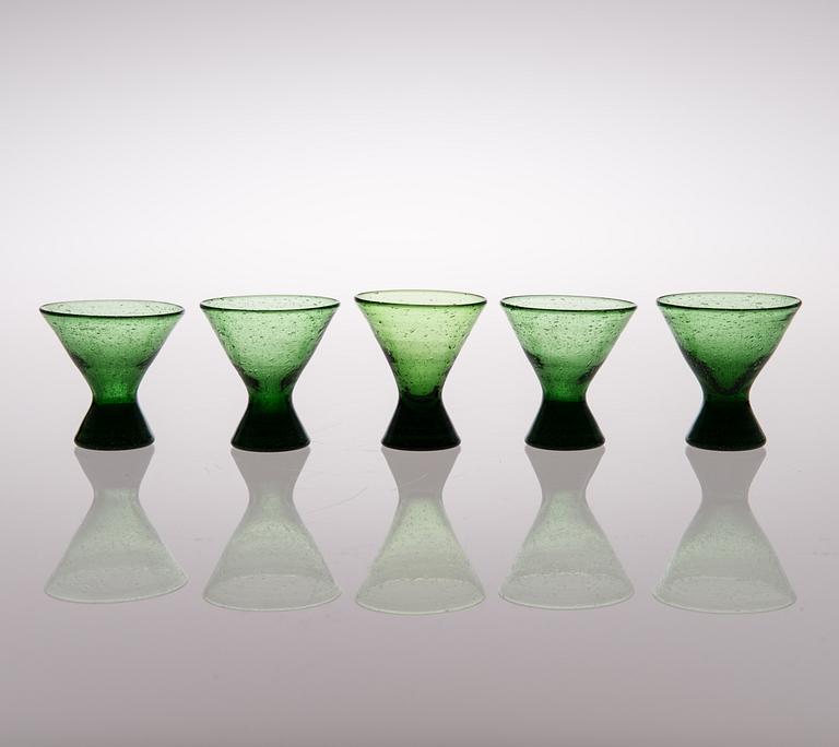 A set of ten "Vähän vino" (Slightly crooked) glasses, manufactured by Karhula in the 1930s.